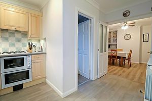 Kitchen / Utility Access / Dining Room- click for photo gallery